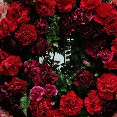 Coroana inmormantare cu garoafe multicolore